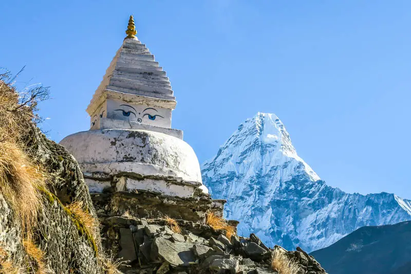 Stupa with mountain peak in background on Short Treks in Nepal