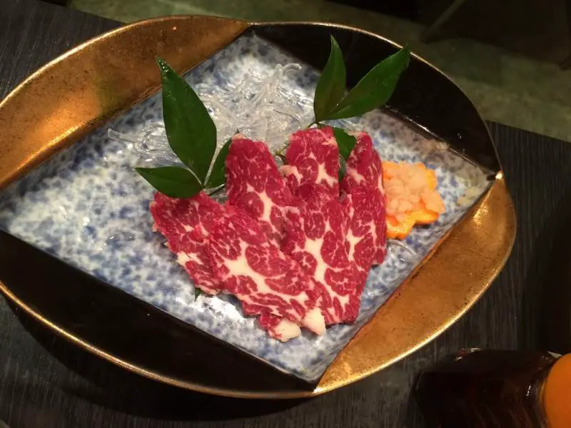 Eating Basashi Raw Horse meat Japan weird exotic food