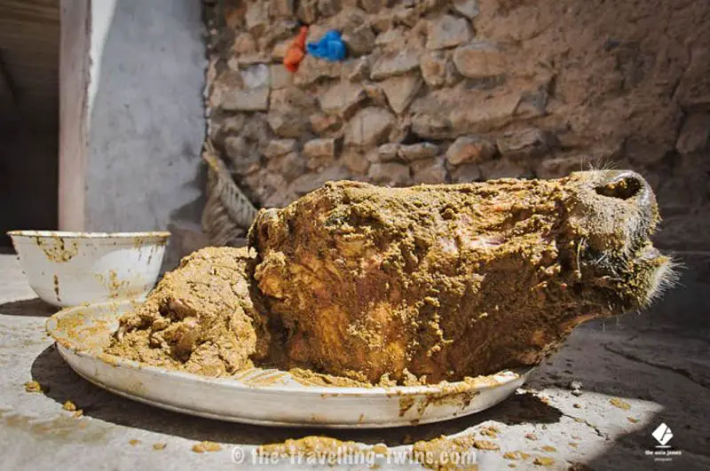 eating shuwa ox head oman weird food