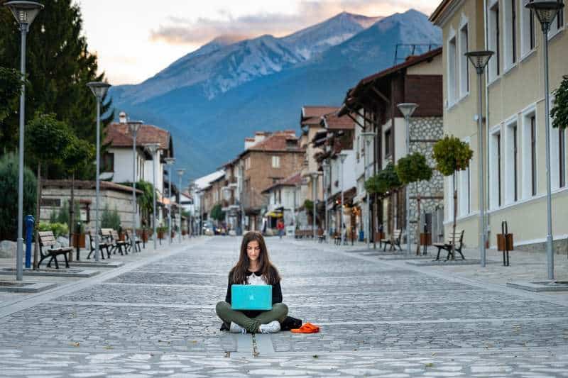 Women with computer working as digital nomad jobs
