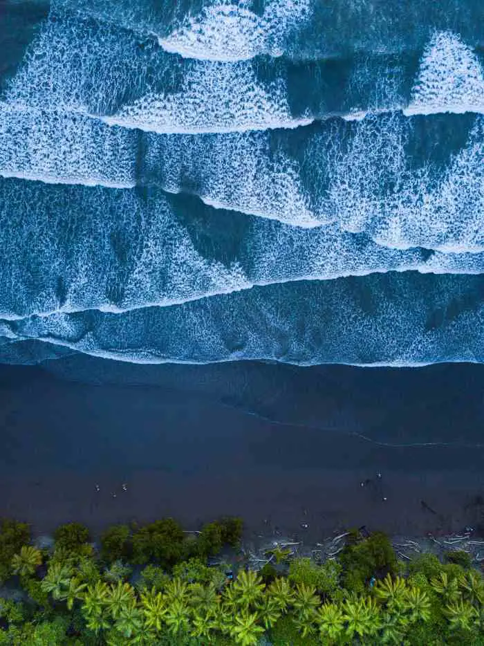Black sand beach costa rica living expat