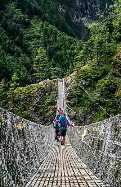 hiking in nepal bridge